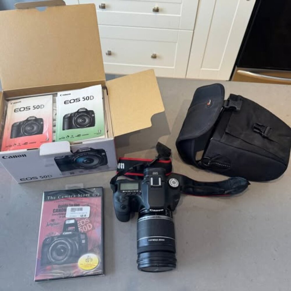 Canon EOS 50D Camera body with 18-200mm Zoom Lens plus 32GB Memory Card